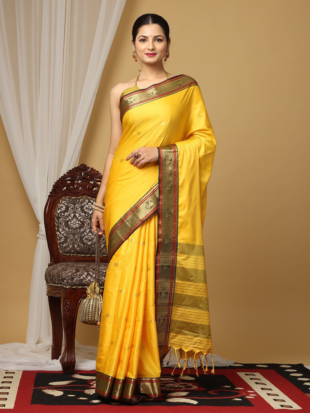 

VASTRANAND Ethnic Motifs Woven Design Zari Detailed Saree, Yellow