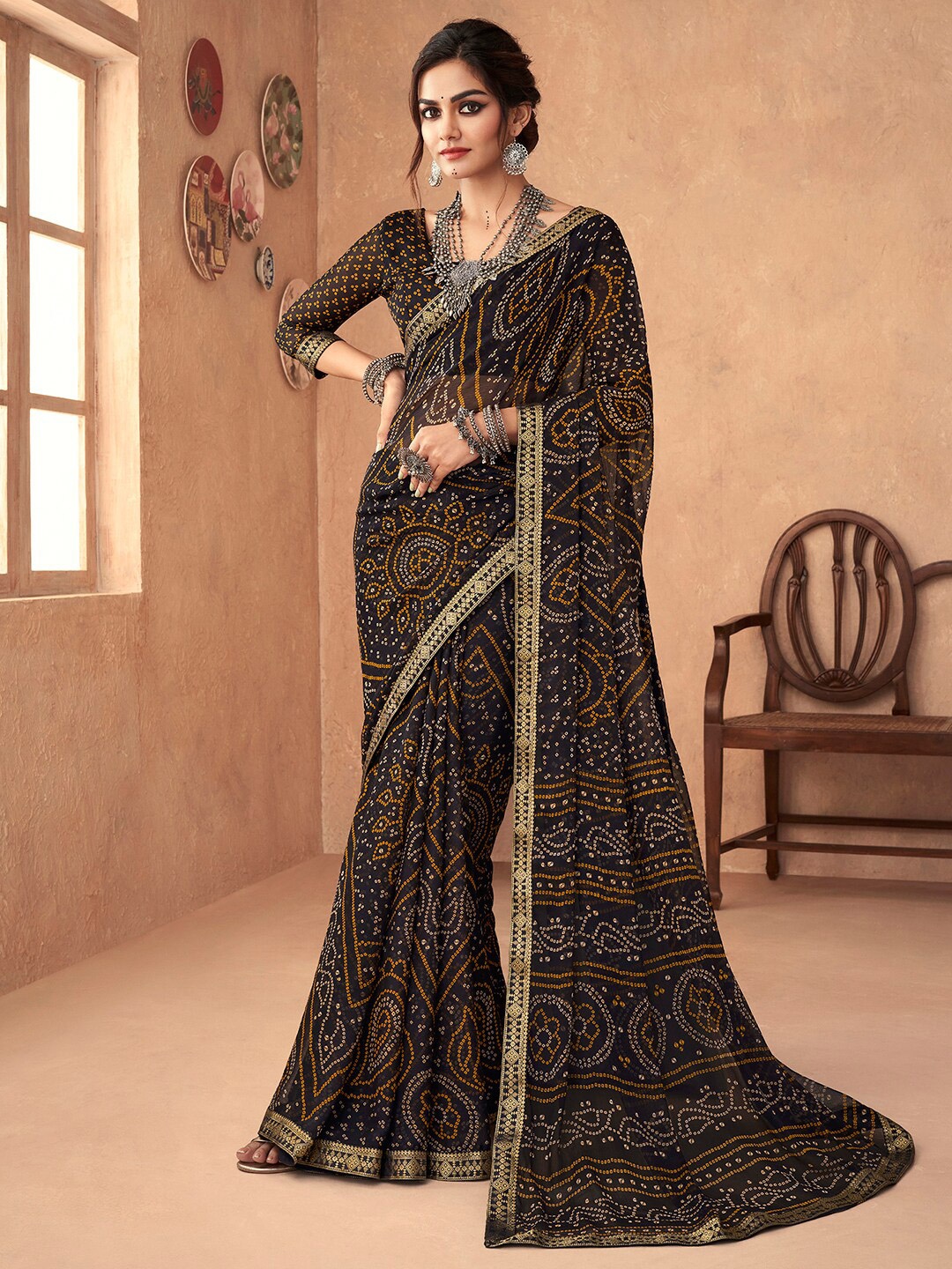 

Anouk Rustic Black & White Bandhani Zari Pure Chiffon Bandhani Saree