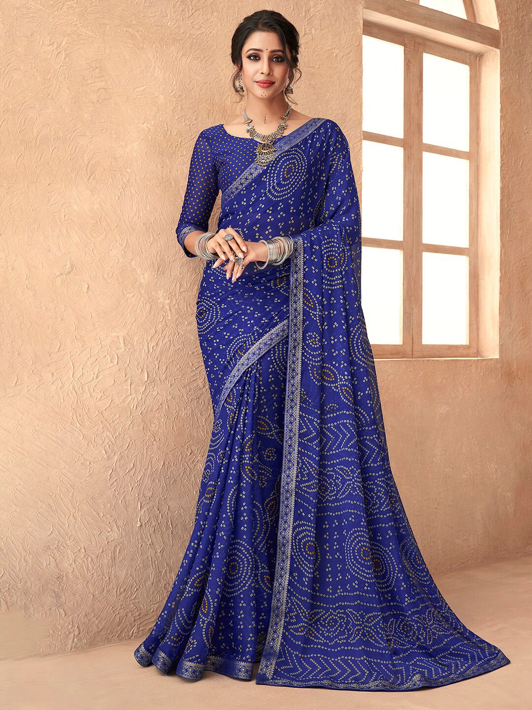 

Anouk Rustic Blue & Yellow Bandhani Zari Pure Chiffon Bandhani Saree