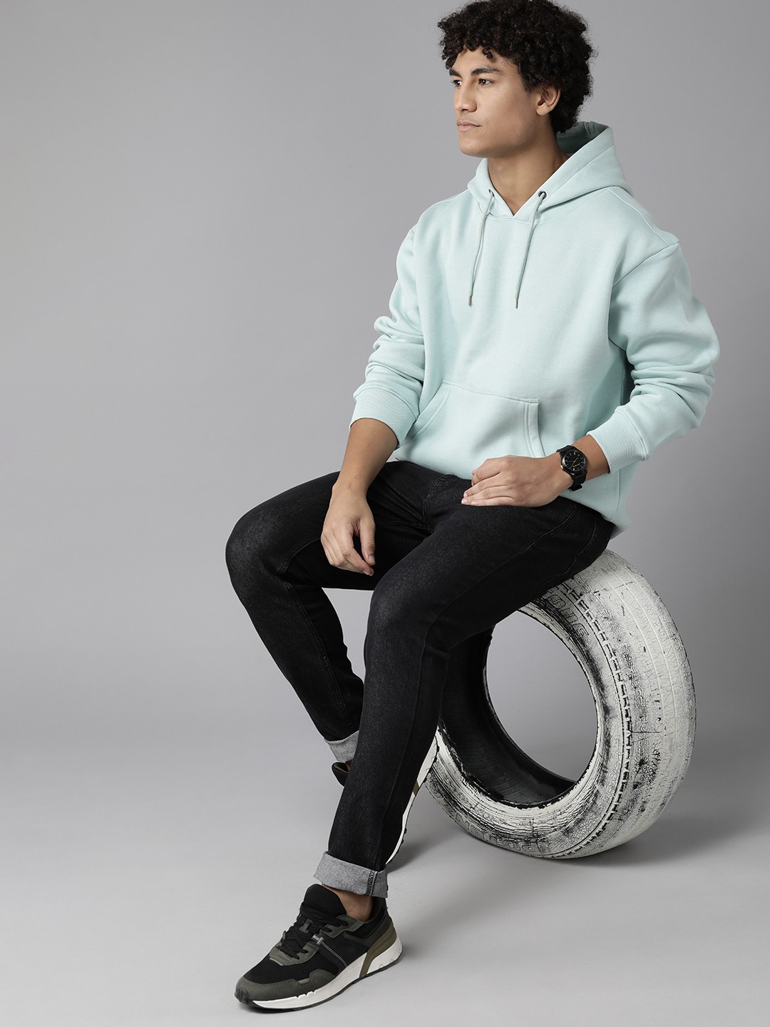 

Roadster Men Solid Hooded Sweatshirt, Turquoise blue