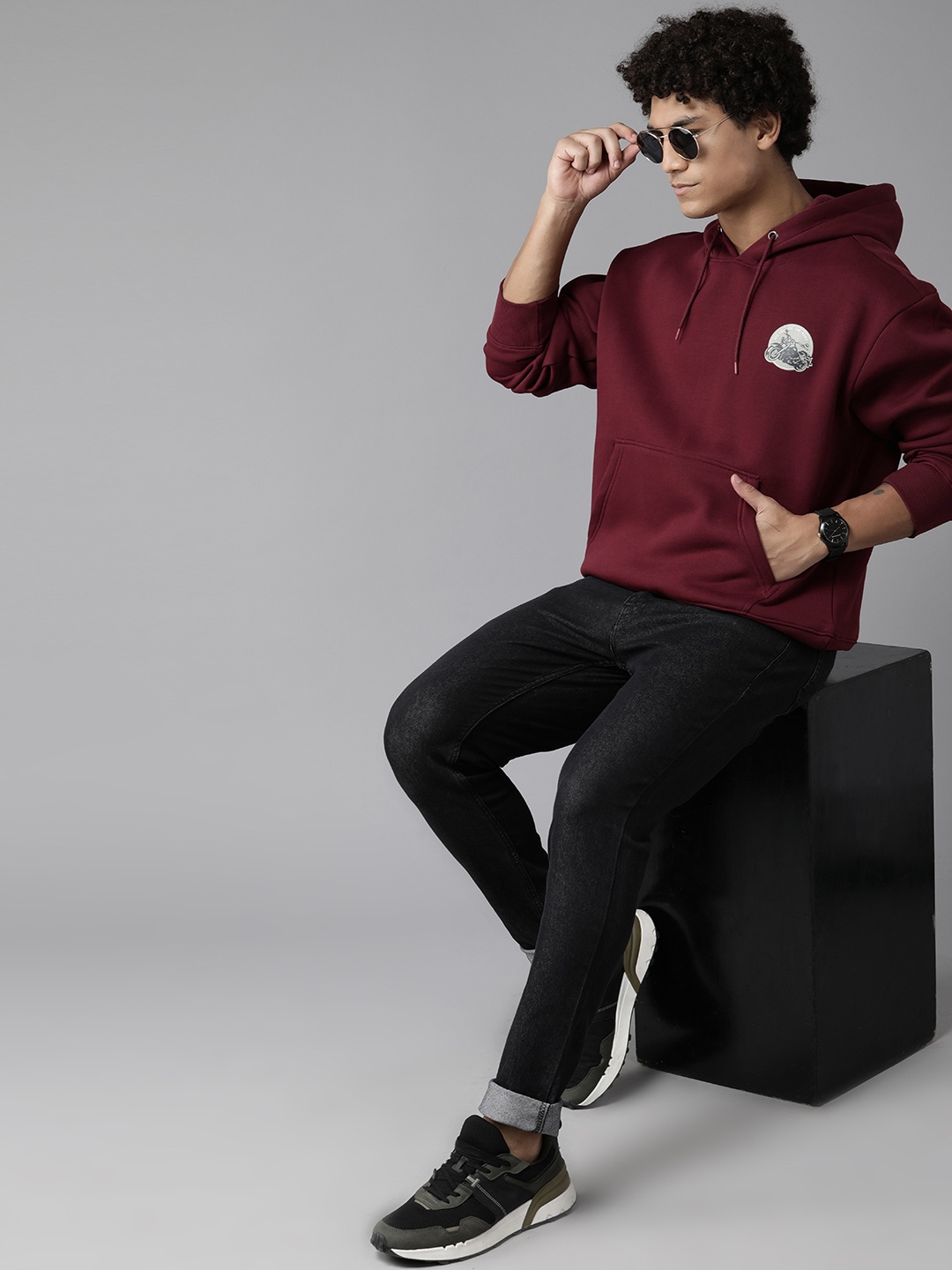 

Roadster Men Printed Hooded Sweatshirt, Maroon