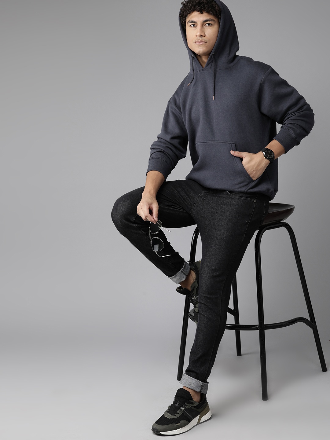 

Roadster Men Solid Hooded Sweatshirt, Charcoal