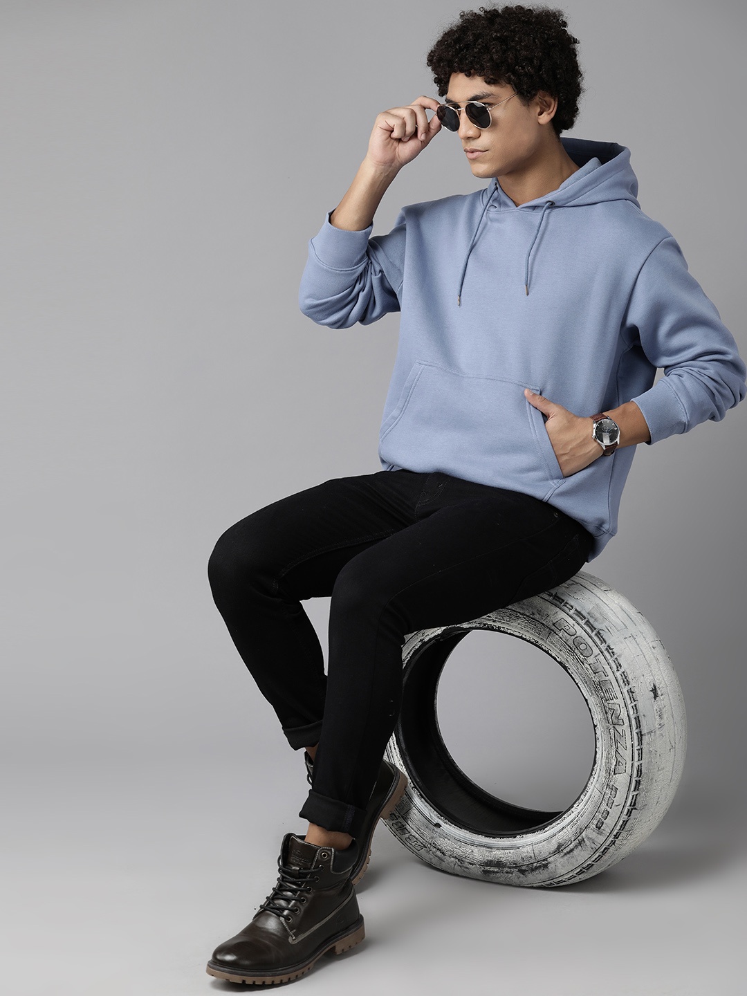 

Roadster Men Solid Hooded Sweatshirt, Blue