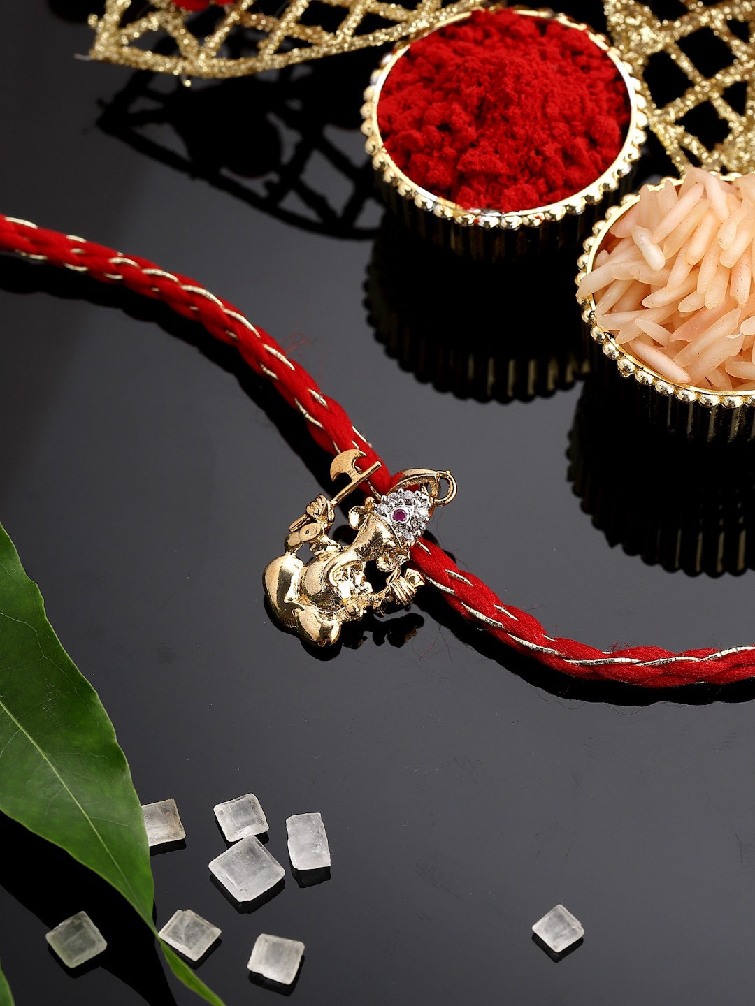 

PANASH Men Gold Plated Stone Studded Thread Rakhi Comes With Roli Chawal