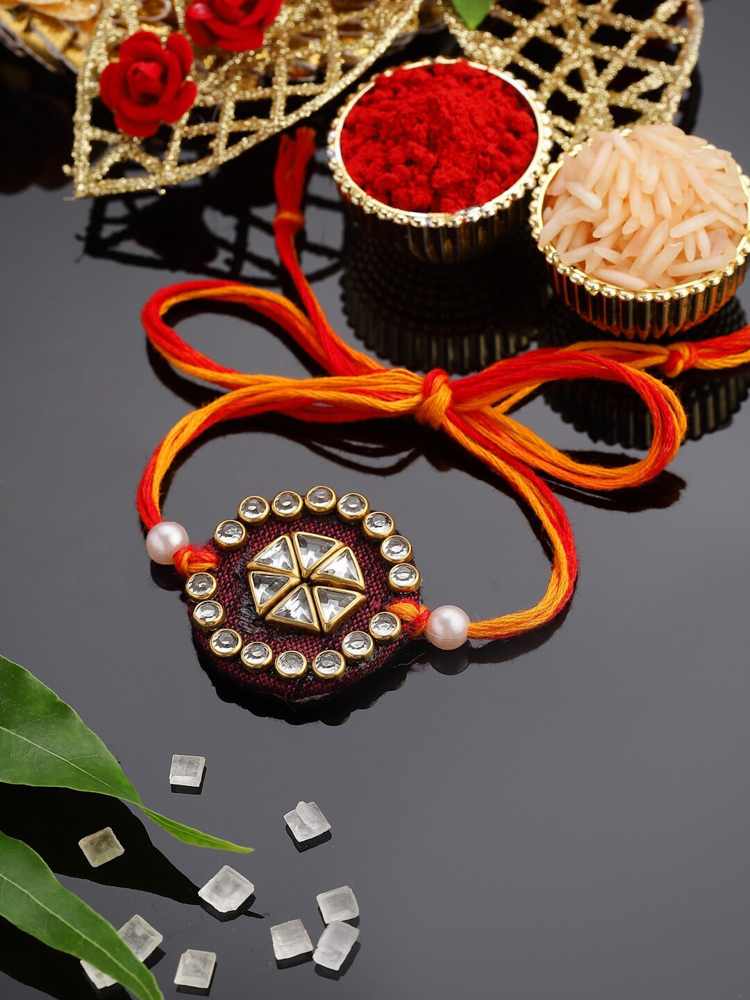 

PANASH Men Gold Plated Stone Studded & Beaded Thread Rakhi With Roli Chawal