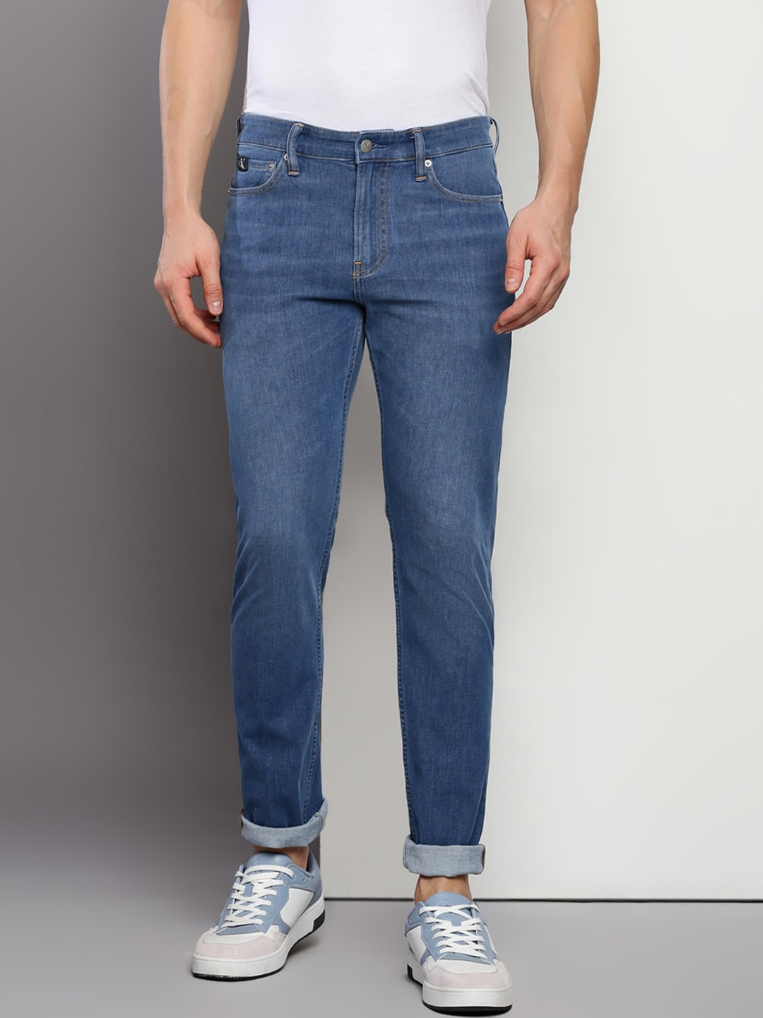 

Calvin Klein Jeans Men Slim Fit Light Fade Stretchable Jeans, Blue