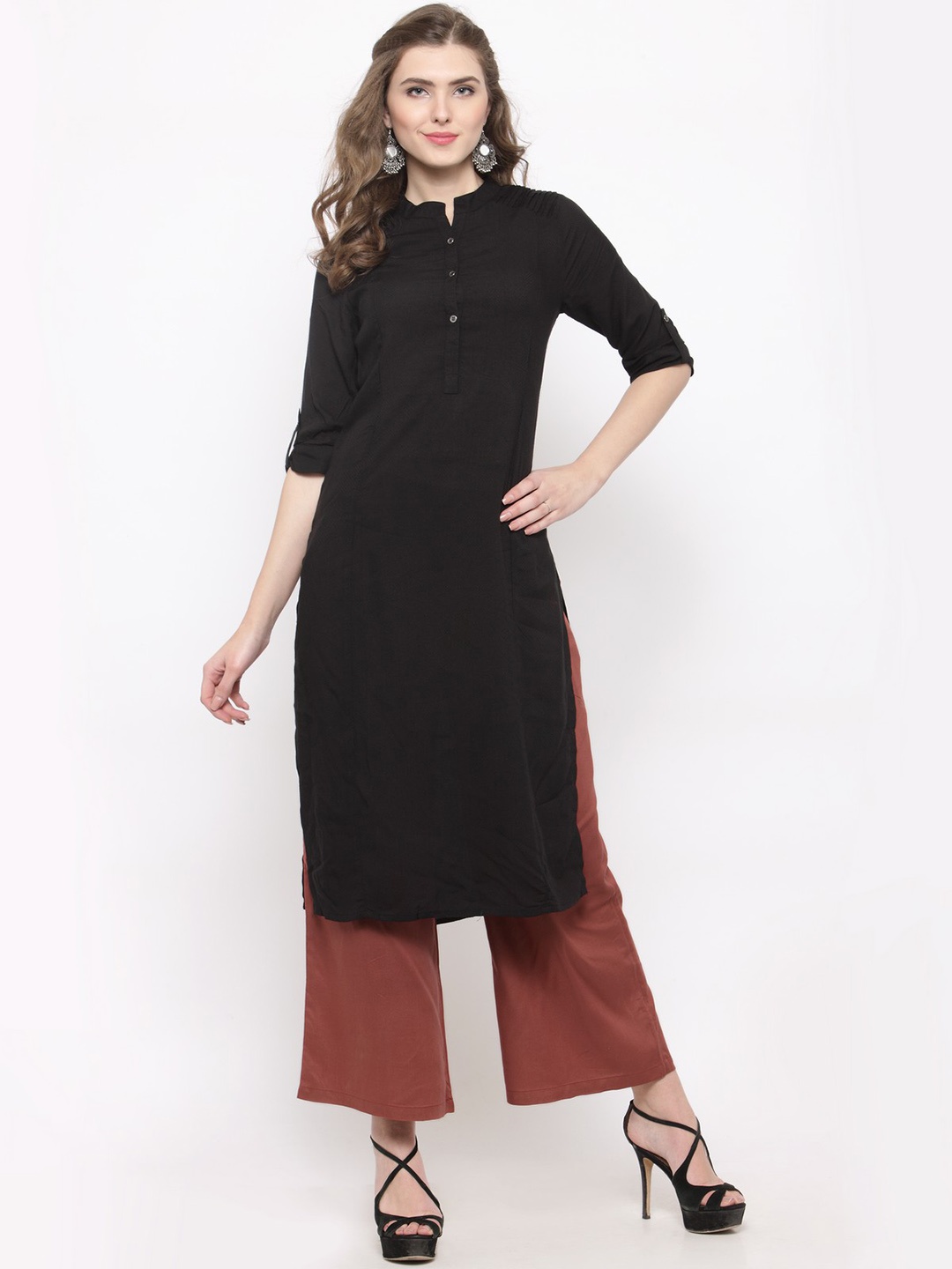 

Sera Women Black Solid Straight Kurta