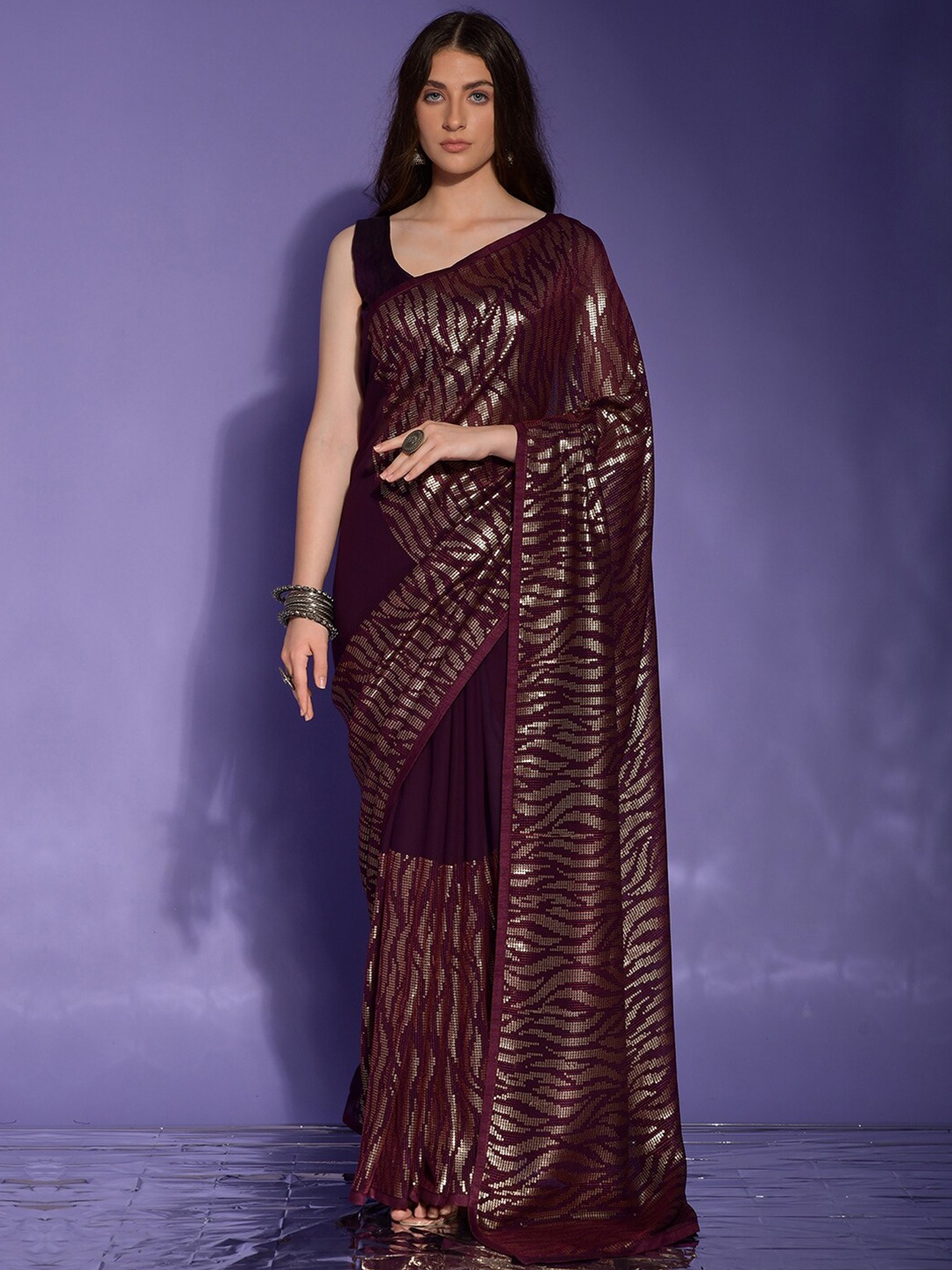 

Anouk Burgundy & Gold-Toned Embellished Sequinned Pure Georgette Saree