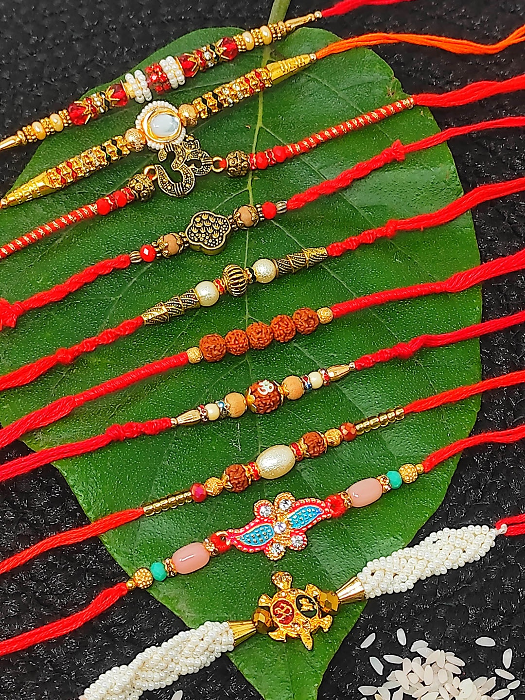 

CRAYTON Set Of 10 Charm Detail Rakhi, Red