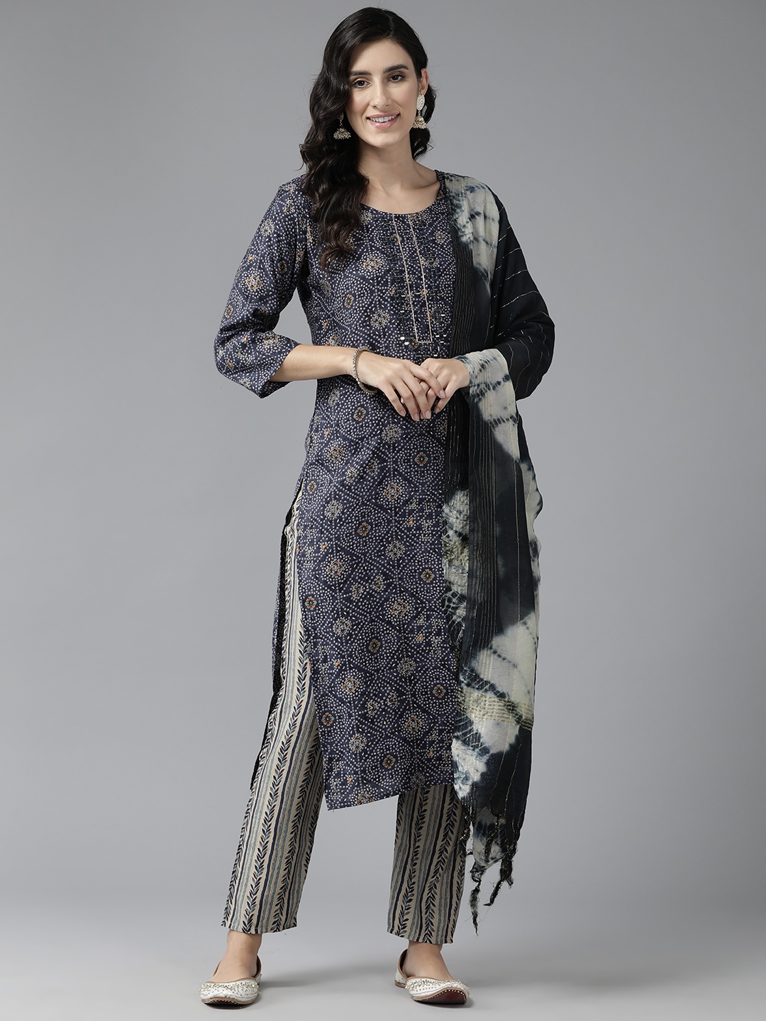 

Aarika Women Bandhani Printed Regular Gotta Patti Cotton Kurta with Trousers & Dupatta, Navy blue