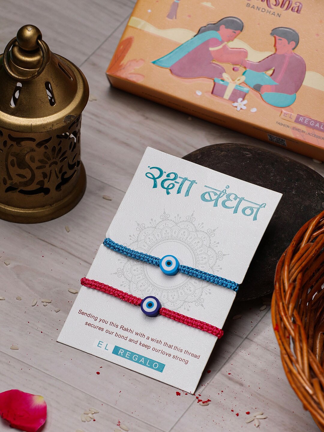 

EL REGALO Bhaiya Bhabhi Set Of 2 Evil Eye Wraparound Rakhi With Roli And Chawal, Blue