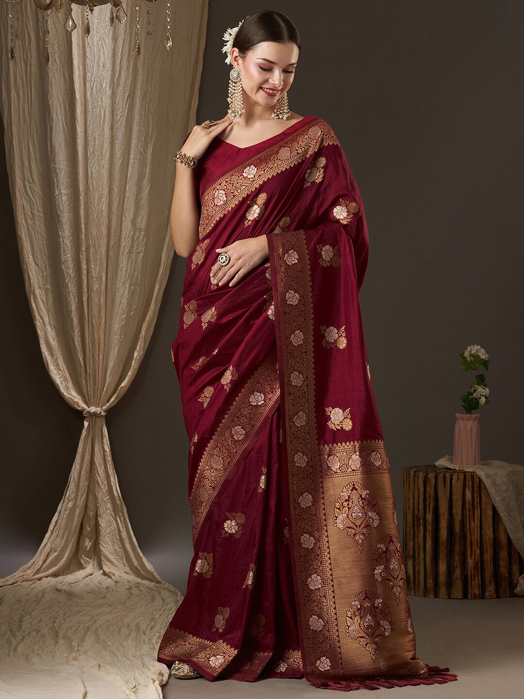 

Anouk Burgundy & Gold-Toned Woven Design Zari Banarasi Saree