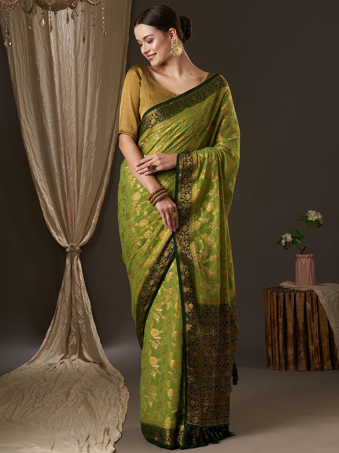 

Anouk Green & Gold-Toned Woven Design Zari Pure Georgette Kanjeevaram Saree