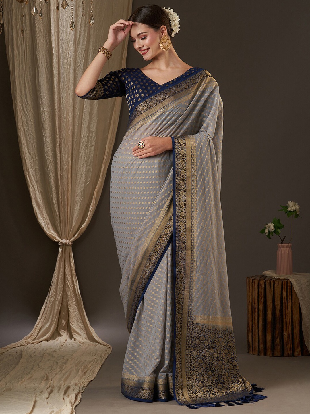 

Anouk Grey & Navy Blue Woven Design Zari Pure Georgette Kanjeevaram Saree