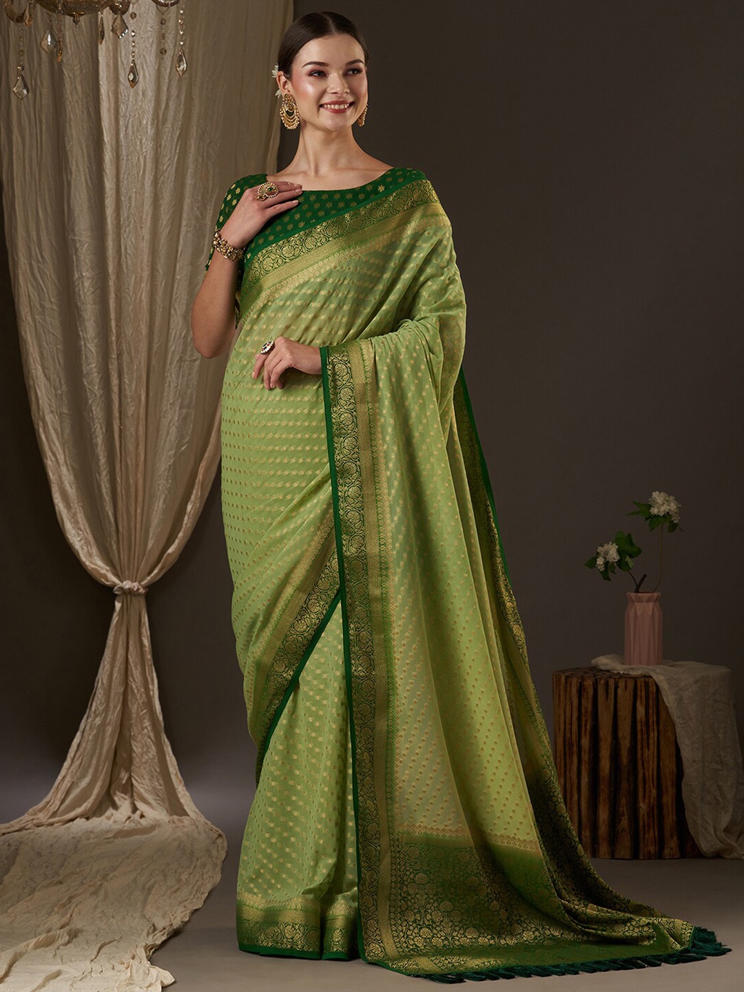 

Anouk Green & Gold-Toned Woven Design Zari Pure Georgette Kanjeevaram Saree