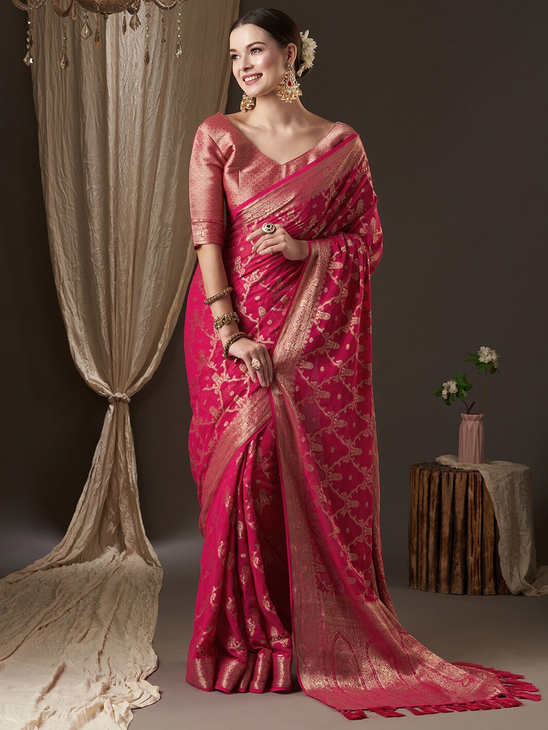

Anouk Pink & Gold-Toned Woven Design Zari Pure Georgette Kanjeevaram Saree