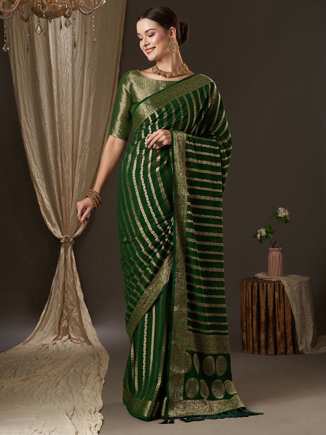 

Anouk Green & Gold-Toned Woven Design Zari Pure Georgette Kanjeevaram Saree