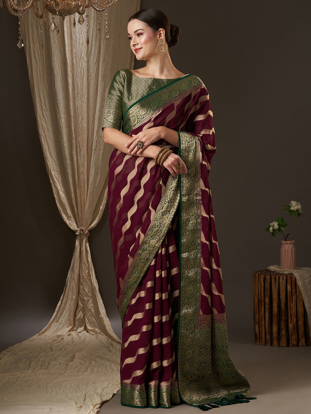 

Anouk Burgundy & Green Woven Design Zari Pure Georgette Kanjeevaram Saree