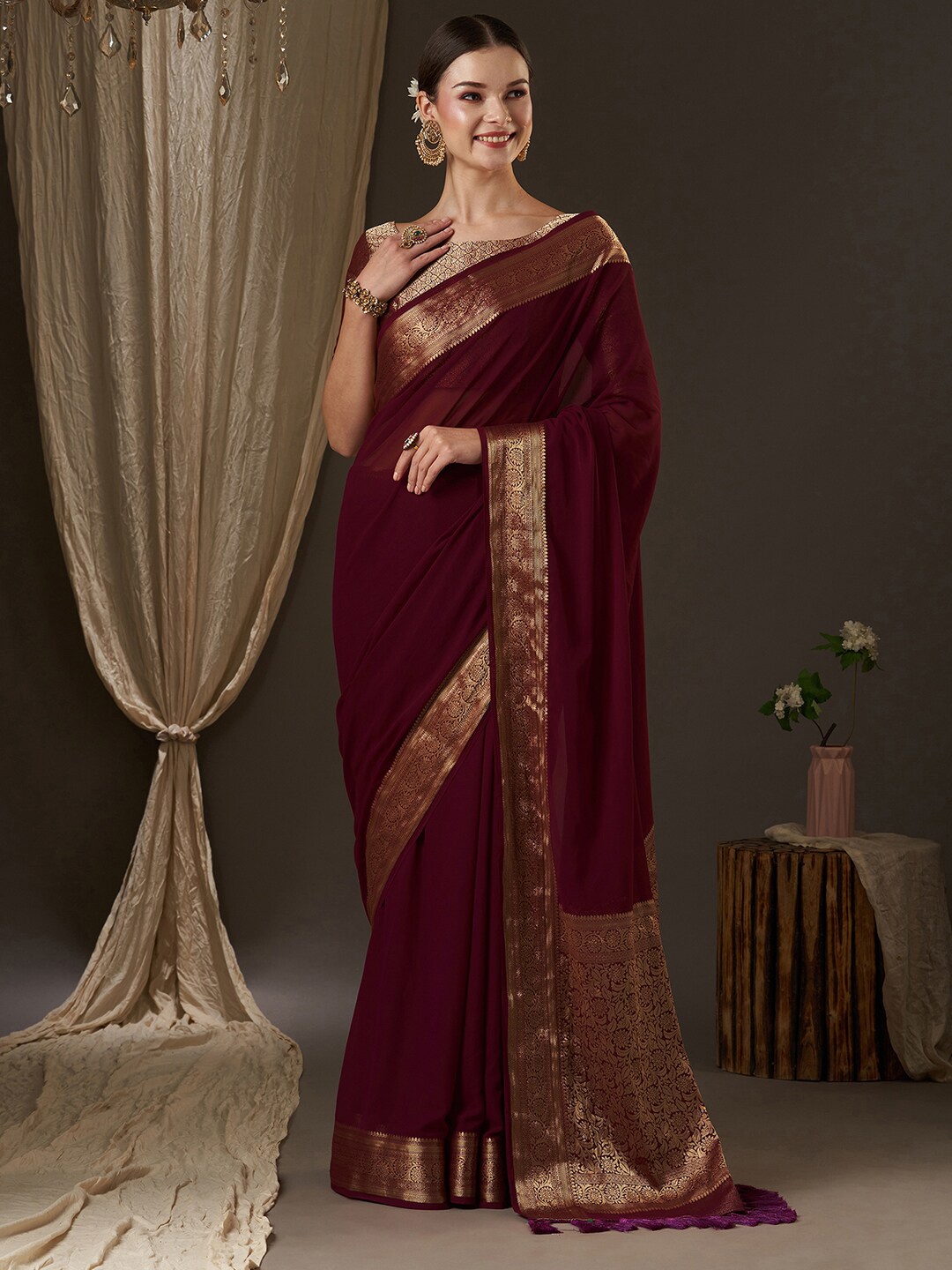 

Anouk Burgundy & Gold-Toned Zari Pure Georgette Kanjeevaram Saree