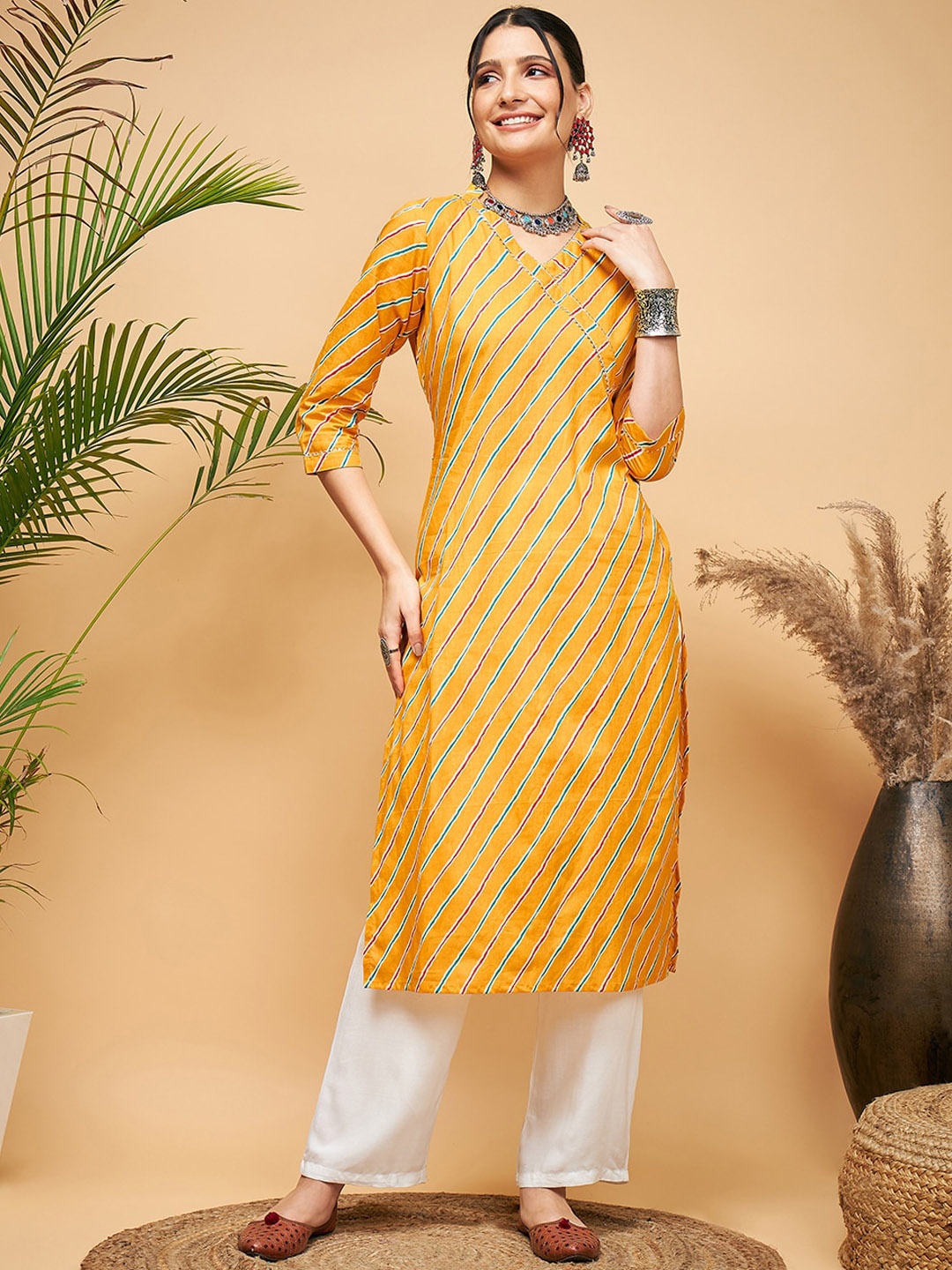 

InWeave Leheriya Printed Regular Pure Cotton Kurta With Trousers, Mustard
