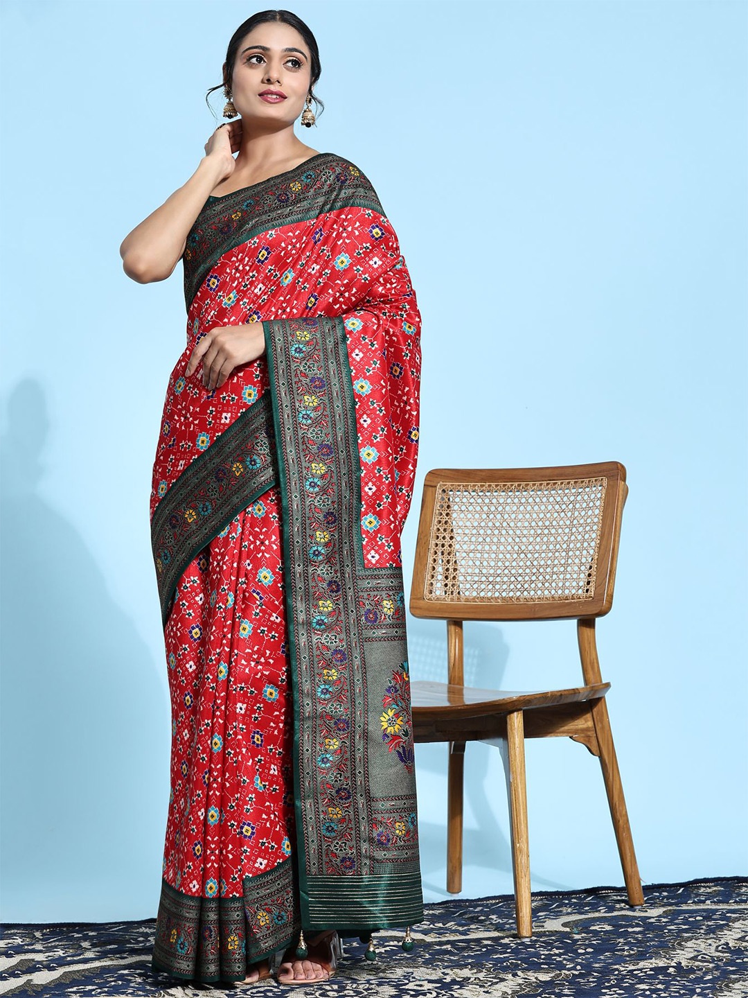 

Phenav Ethnic Motifs Printed Patola Saree, Red