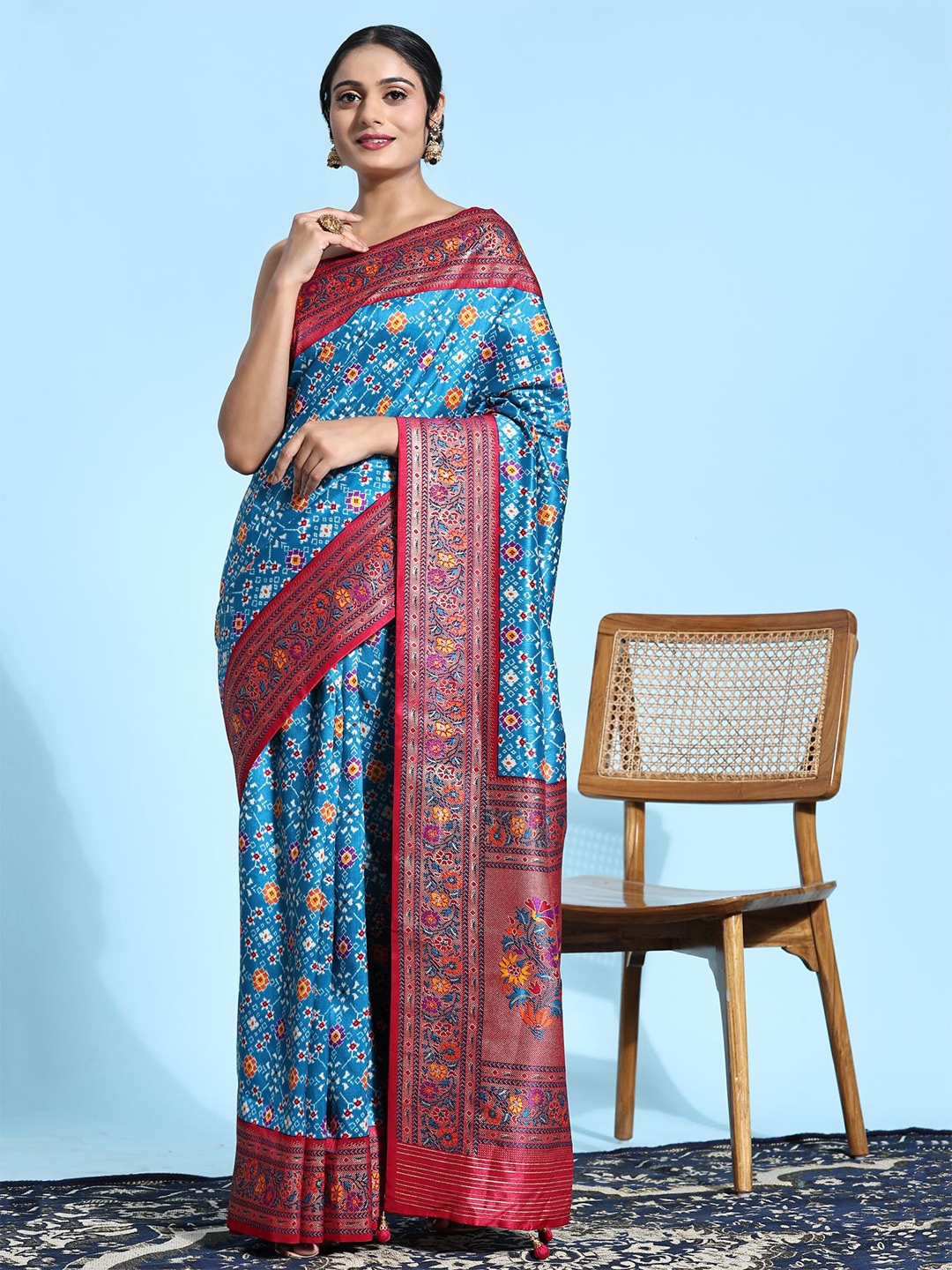 

Phenav Ethnic Motifs Printed Patola Saree, Blue