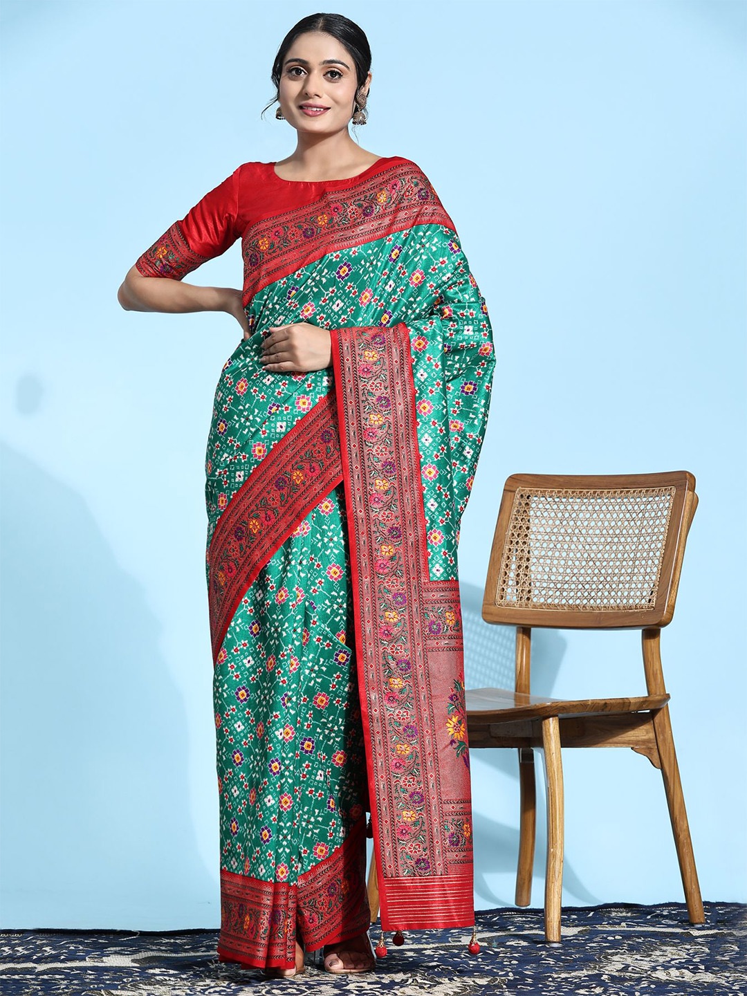 

Phenav Ethnic Motifs Printed Patola Saree, Green