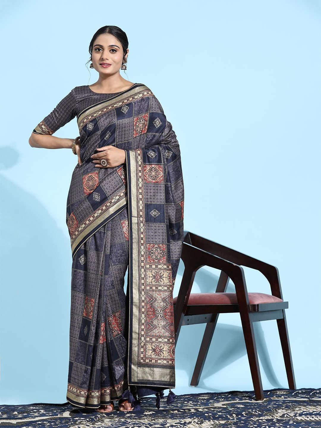 

Phenav Ethnic Motifs Printed Zari Patola Saree, Blue