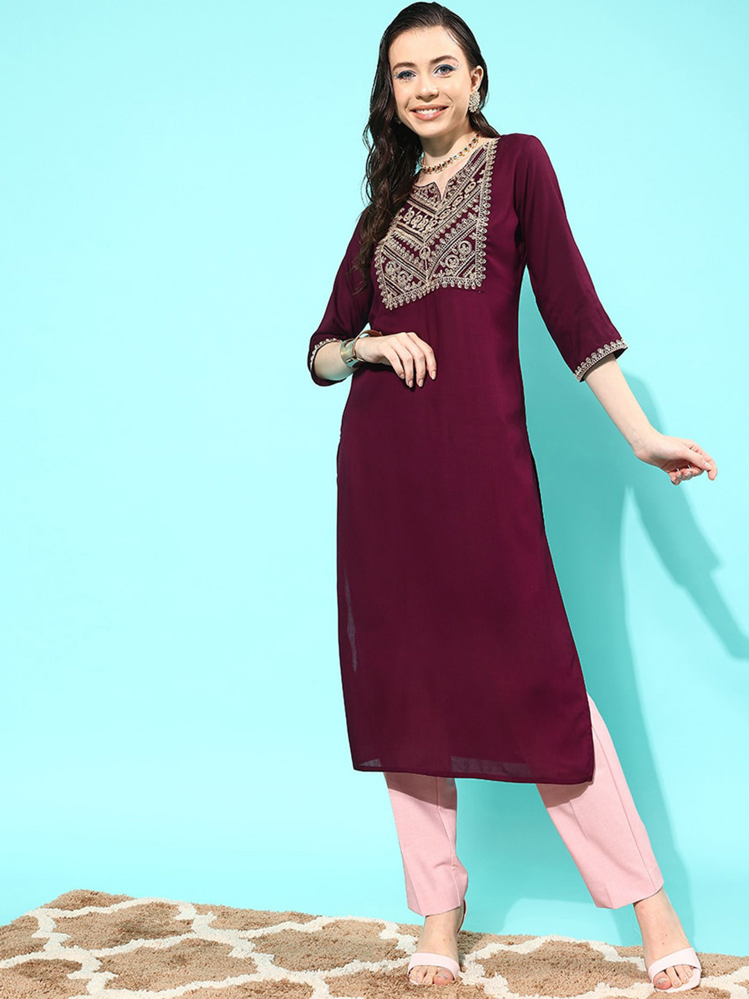 

Nayo Women Yoke Design Flared Sleeves Thread Work Straight Kurta, Burgundy