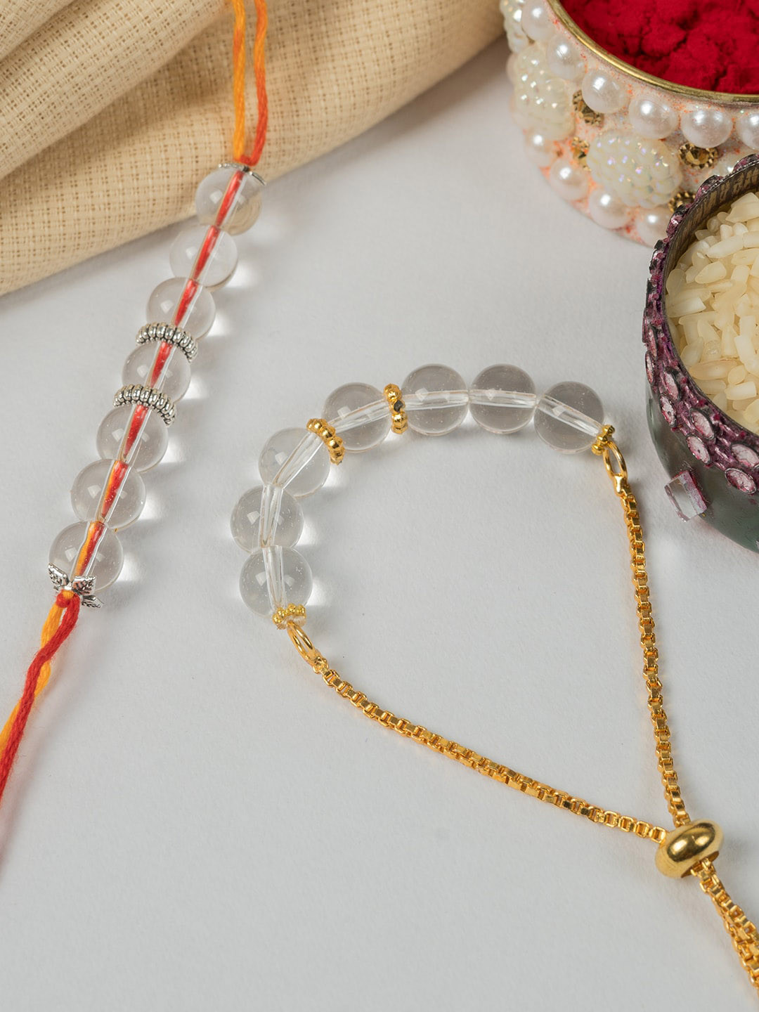 

SHOOLIN Set of 2 Beaded Rakhis With Roli & Chawal With Greeting Card, Yellow