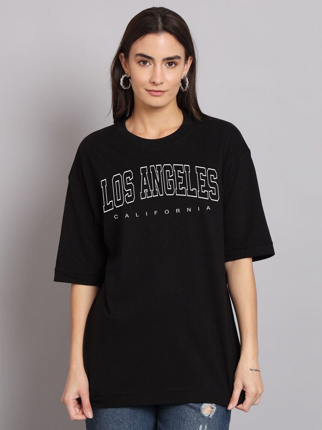 

Imsa Moda Typography Printed Drop-Shoulder Sleeves Cotton Oversized T-shirt, Black