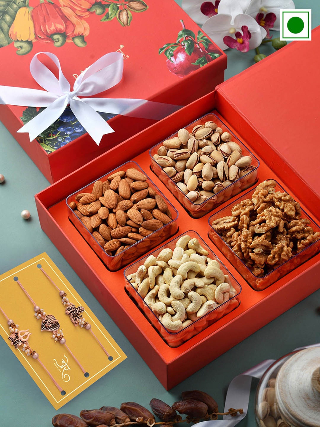 

RawFruit Set Of 3 Rakhis With Roli Chawal & Signature Dryfruit Gift Set, Rose gold
