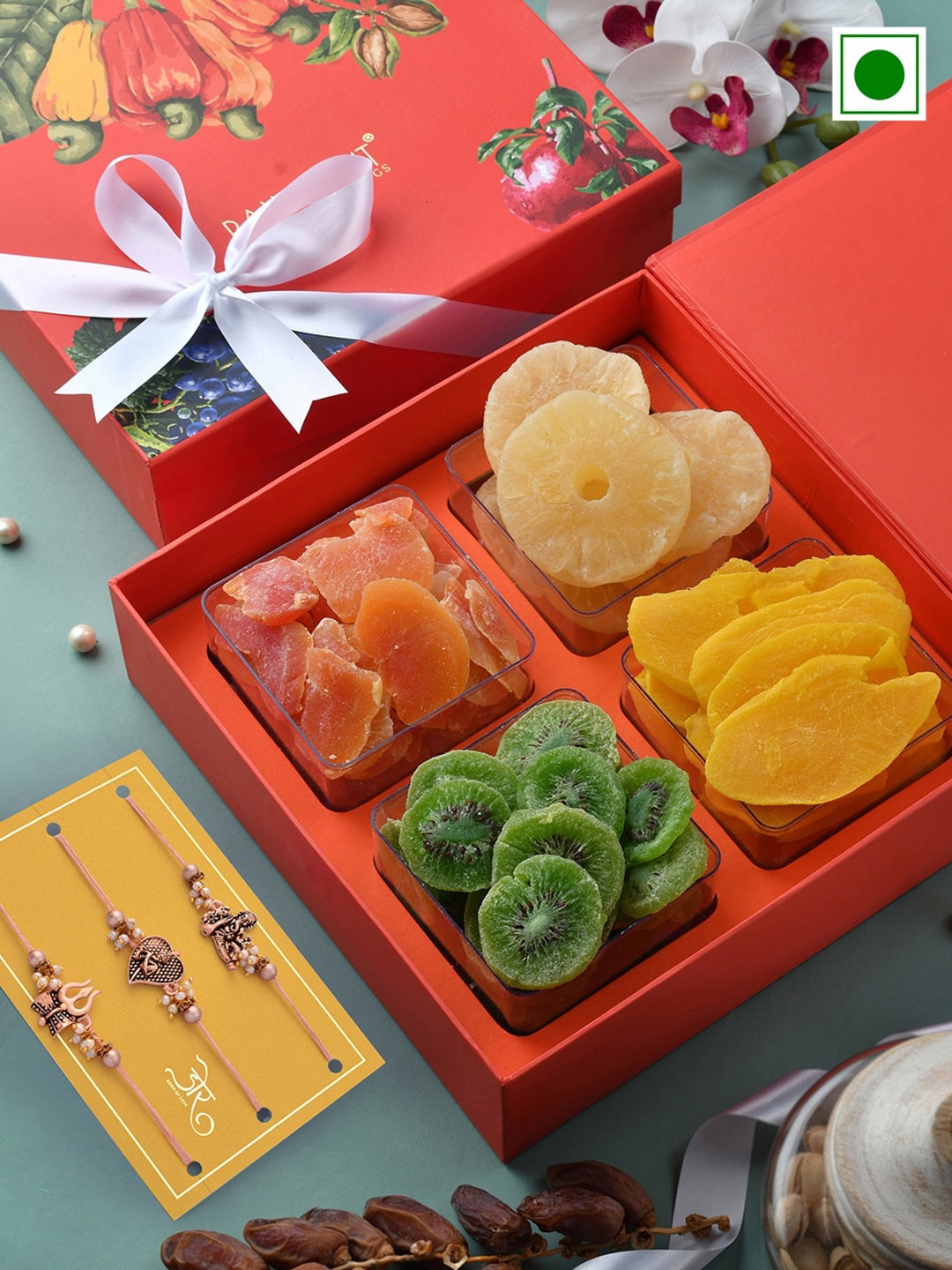

RawFruit Set Of 3 Rakhis With Roli Chawal & Signature Dryfruit Gift Set, Rose gold
