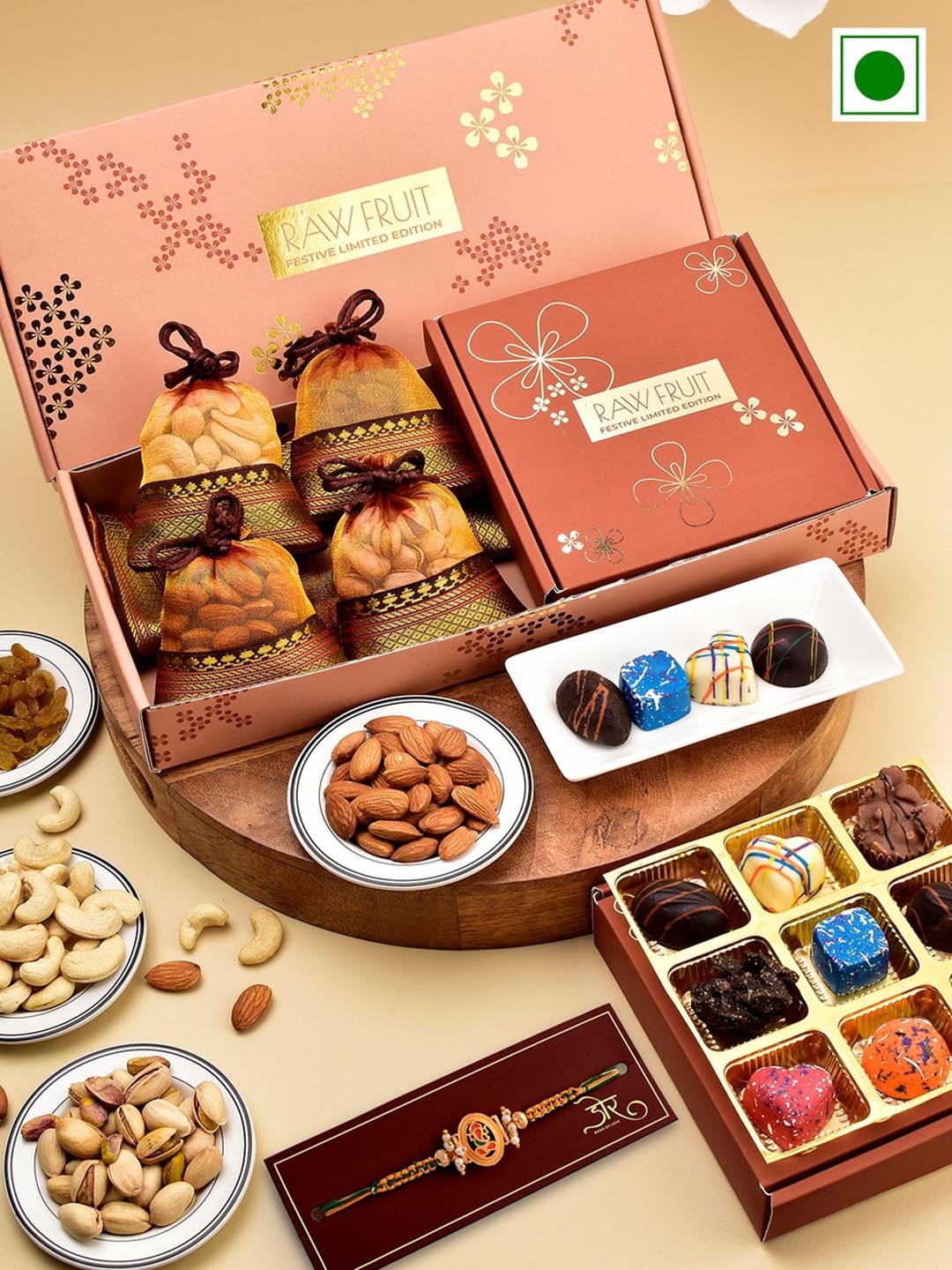 

RawFruit Ganesh Charm Beaded Rakhi With Dryfruits & Chocolate Gift Set, Brown