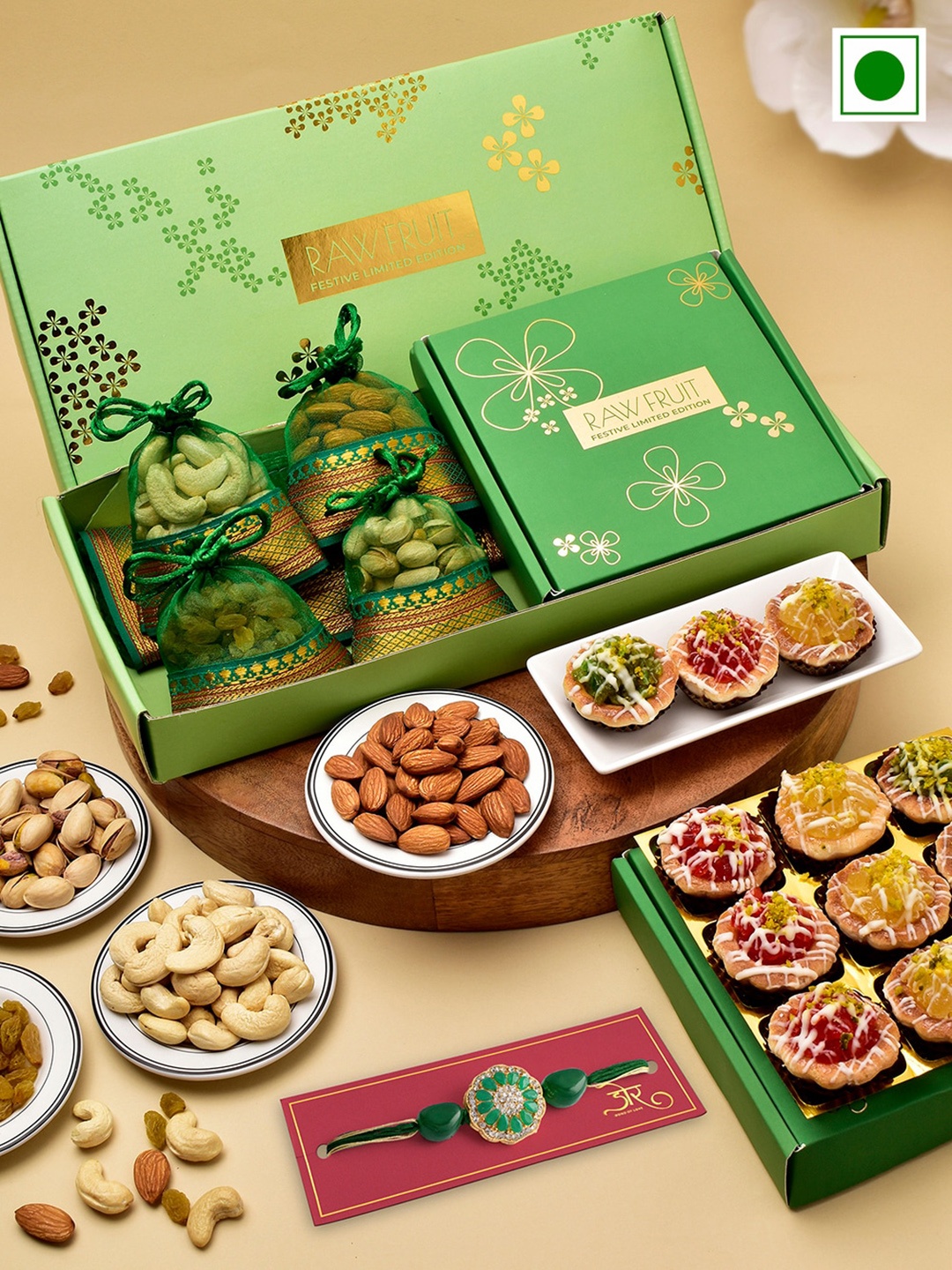 

RawFruit Stone Studded Rakhi With Dryfruit & Tarts Sweets Gift Set, Green