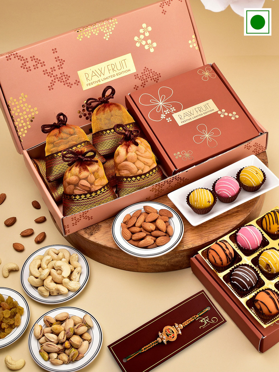 

RawFruit Ganesh Charm Rakhi With Dryfruits & Sweets Gift Set, Yellow