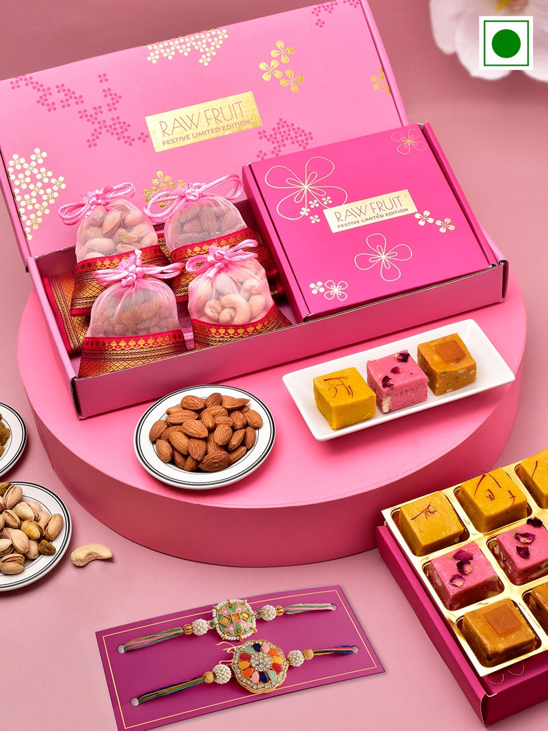 

RawFruit Set Of 2 Rakhi With Fudge Dryfruit Gift Set, Pink
