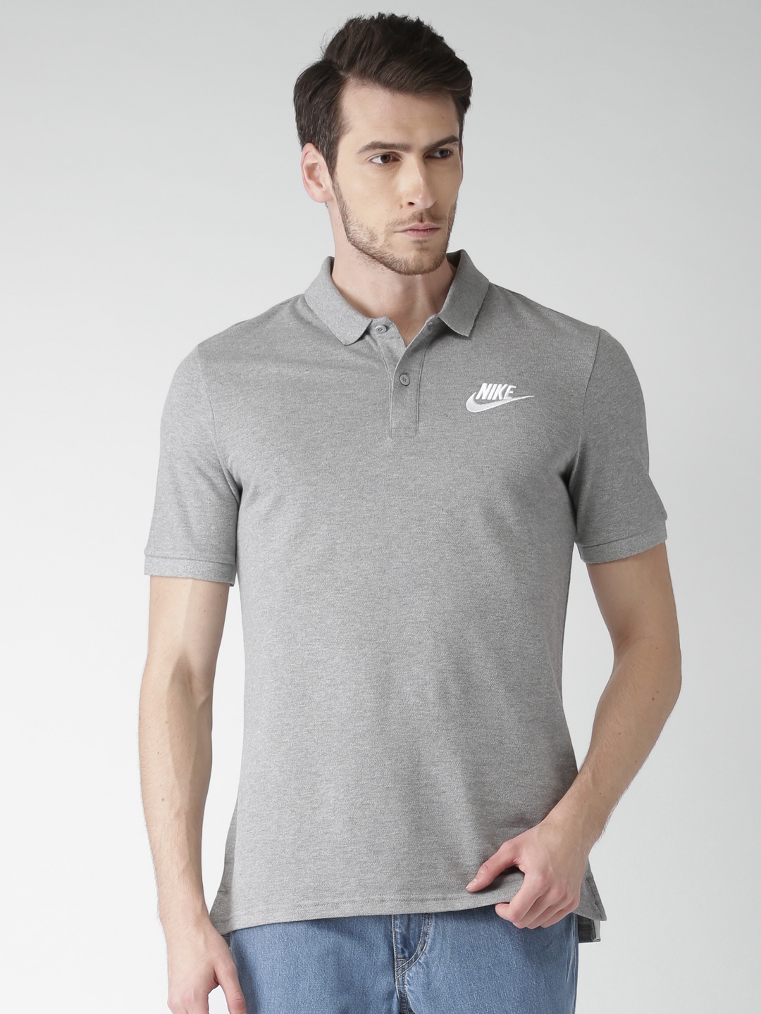 

Nike Men Grey Solid Polo Collar Pure Cotton T-shirt