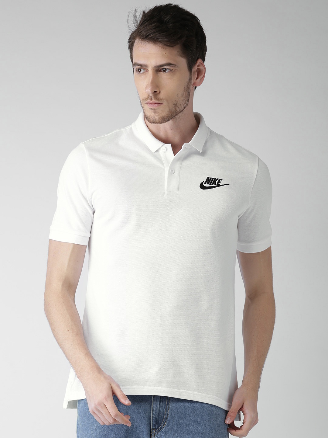 

Nike Men White Solid Polo Collar Pure Cotton T-shirt