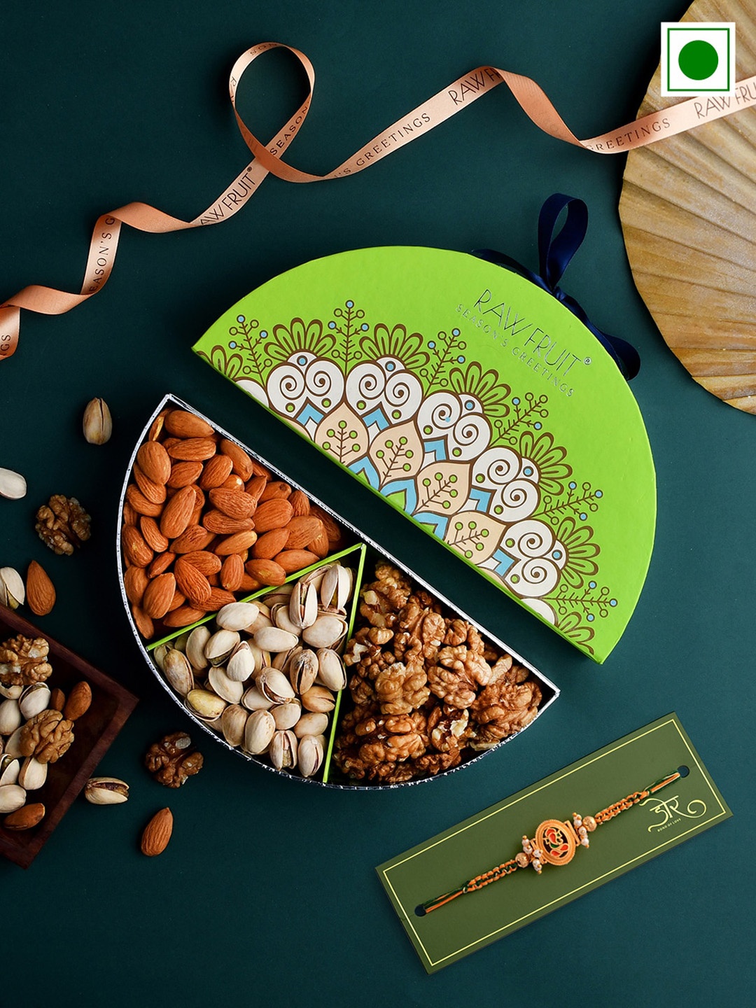 

RawFruit Ganesh Charm Rakhi With Dry Fruits Gift Set - 300gms, Yellow