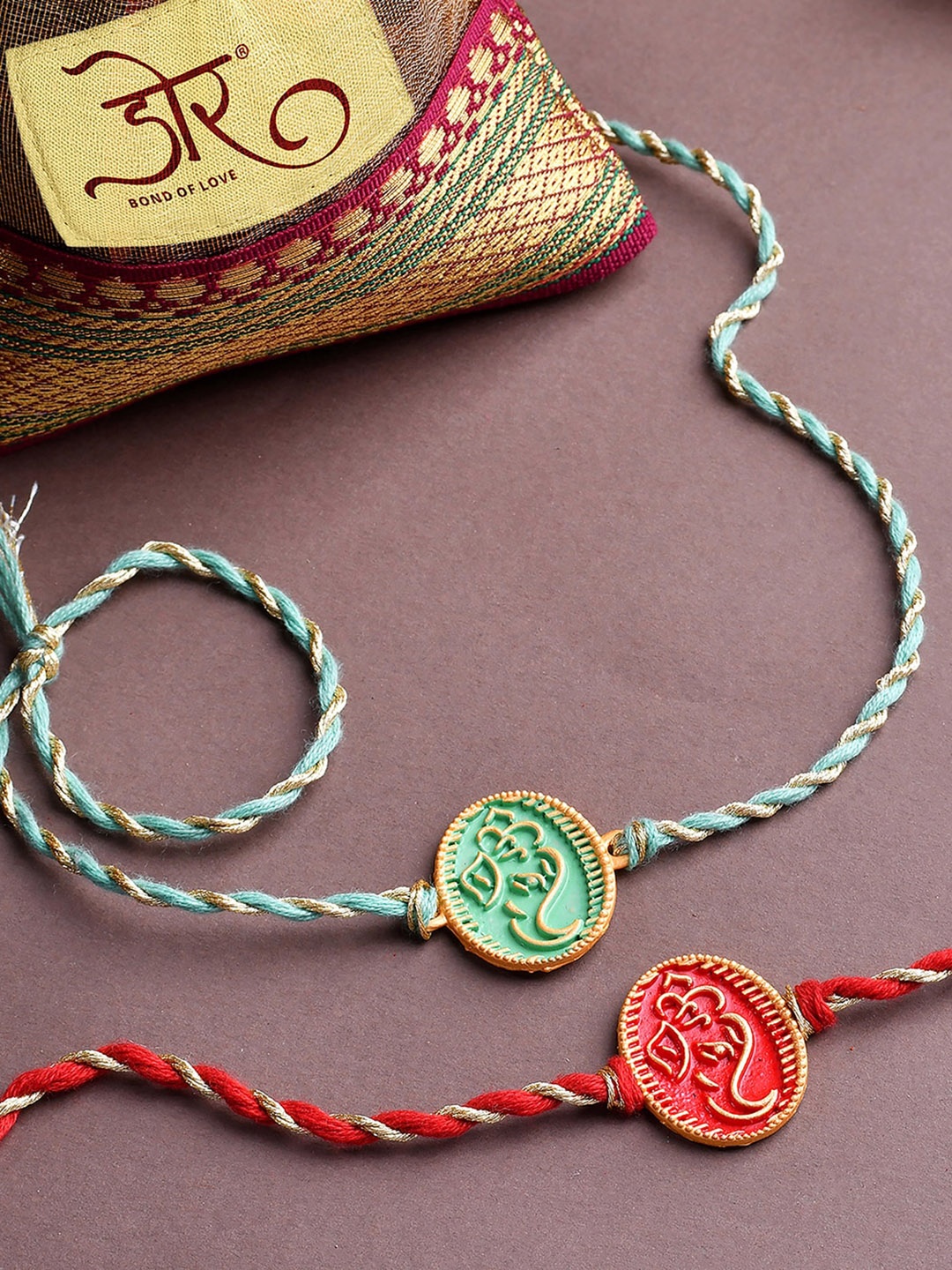 

RawFruit Set Of 2 Ganesh Charm Rakhi With Nuts Treasure Gift Pack- 100g Each, Red