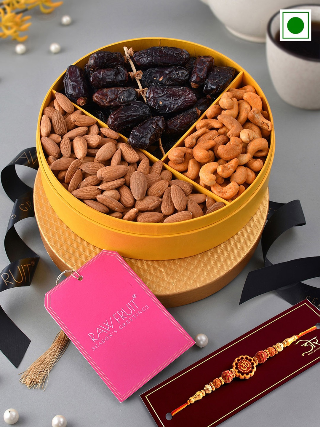 

RawFruit OM Detailed Beaded Rakhis With Gourmet Dryfruit Delights Pack, Brown