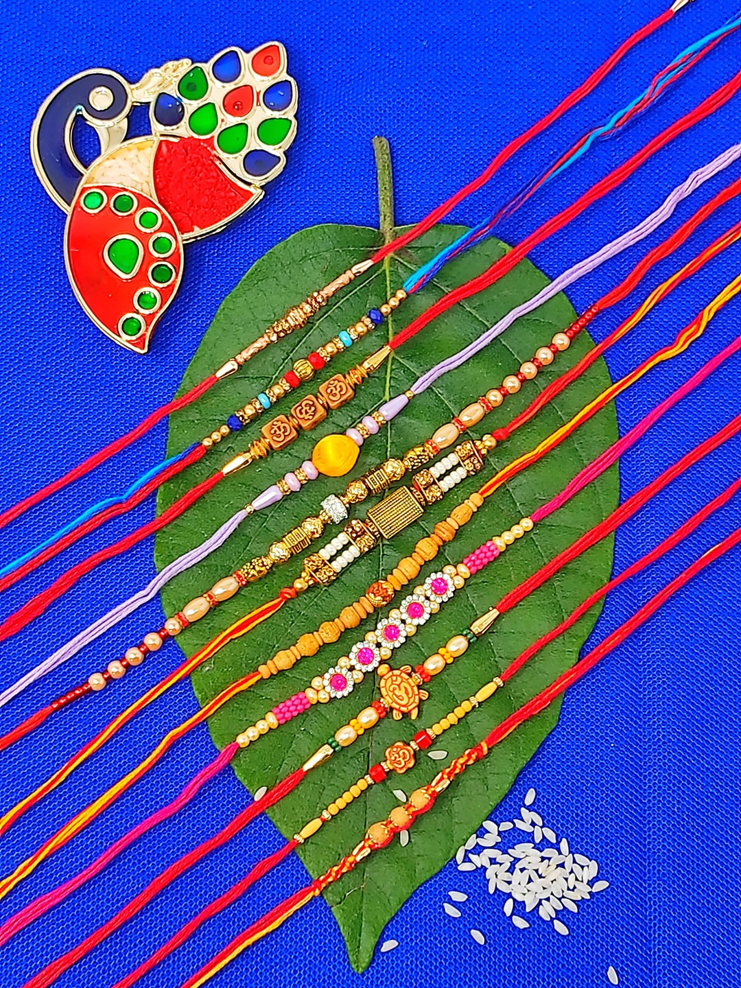 

CRAYTON Set of 11 Rakhi Gift Set With Roli Chawal Holder, Gold