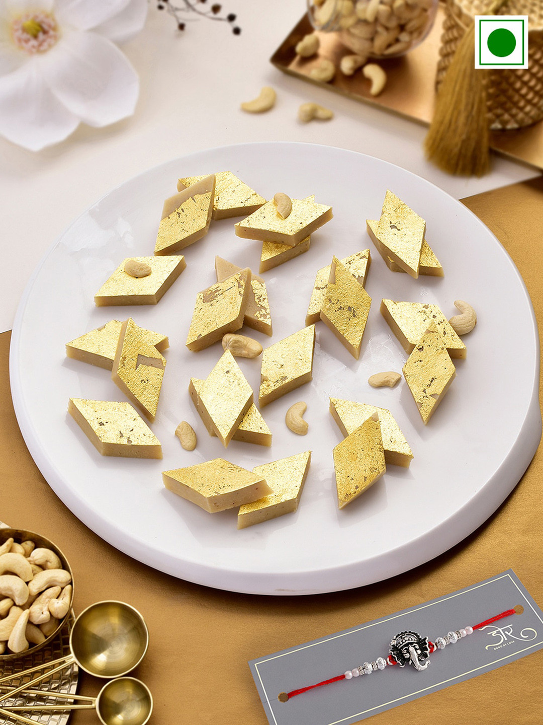 

RawFruit Ganesh Charm Rakhi With Sweet Gift Set, Red