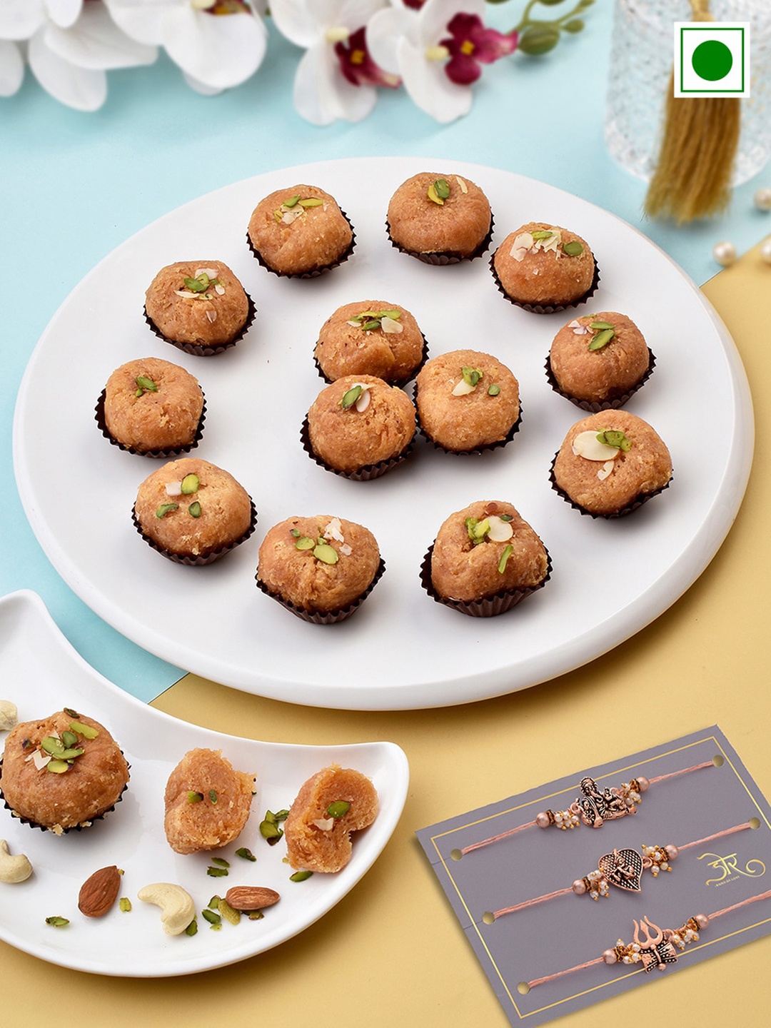 

RawFruit Set Of 3 Beaded Rakhis With Roli Chawal & Balushahi Sweets-200 gms, Rose gold