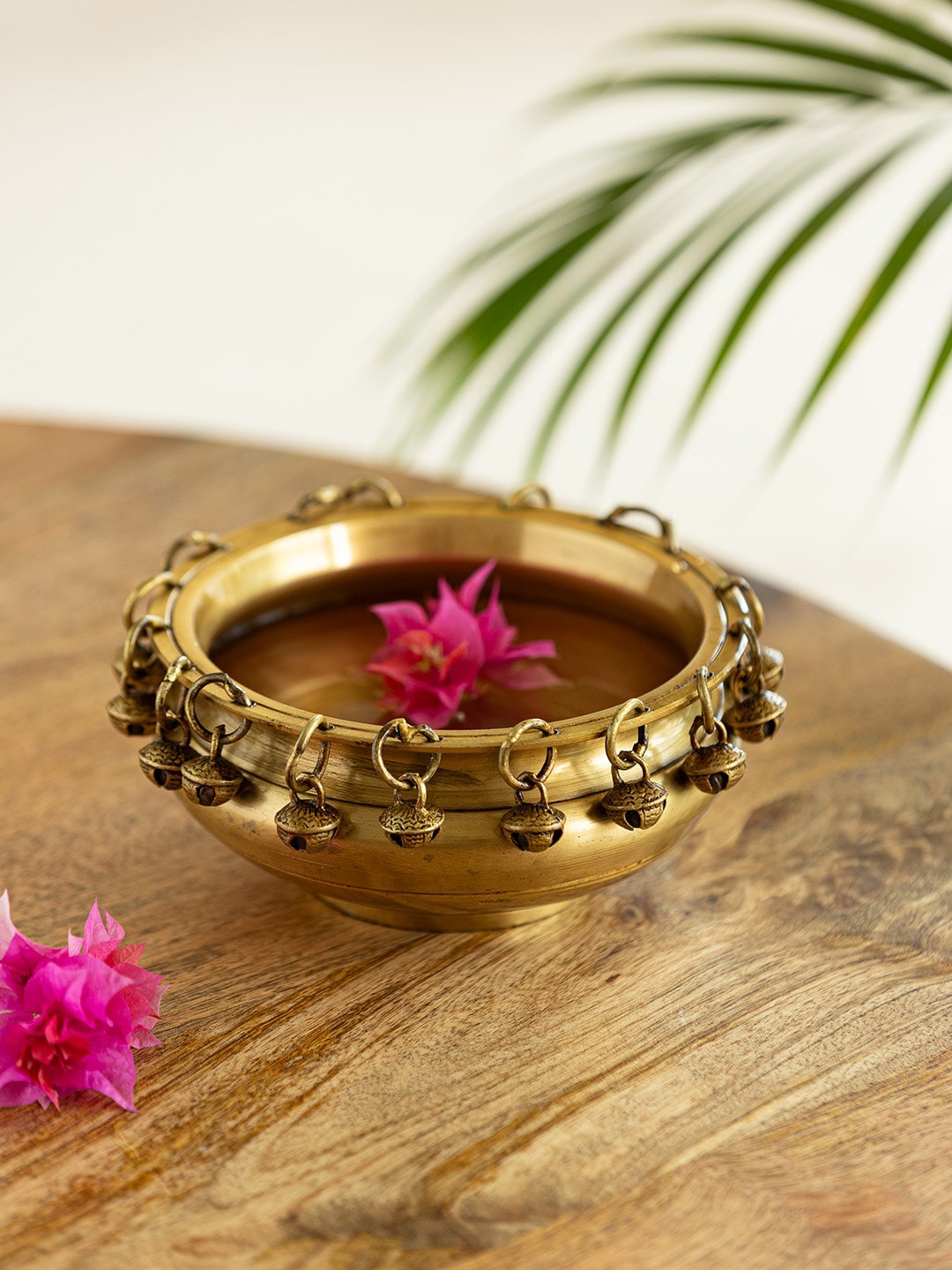 

ExclusiveLane Zeenat Beige Brass Urli Bowl With Bells, Gold