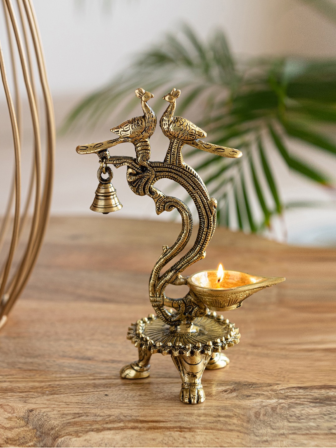 

ExclusiveLane The Brass Beams Textured Peacock Pair Diya, Gold