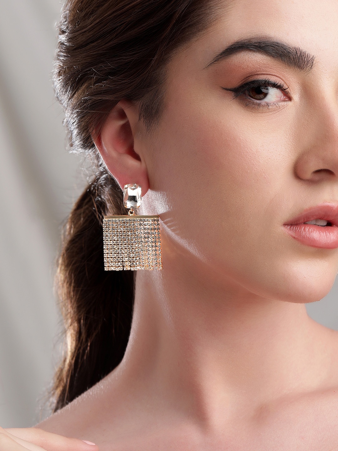 

Rubans Voguish 18K Gold Plated Glamorous AD & Zicronia Studded Multilayerd Drop Earrings