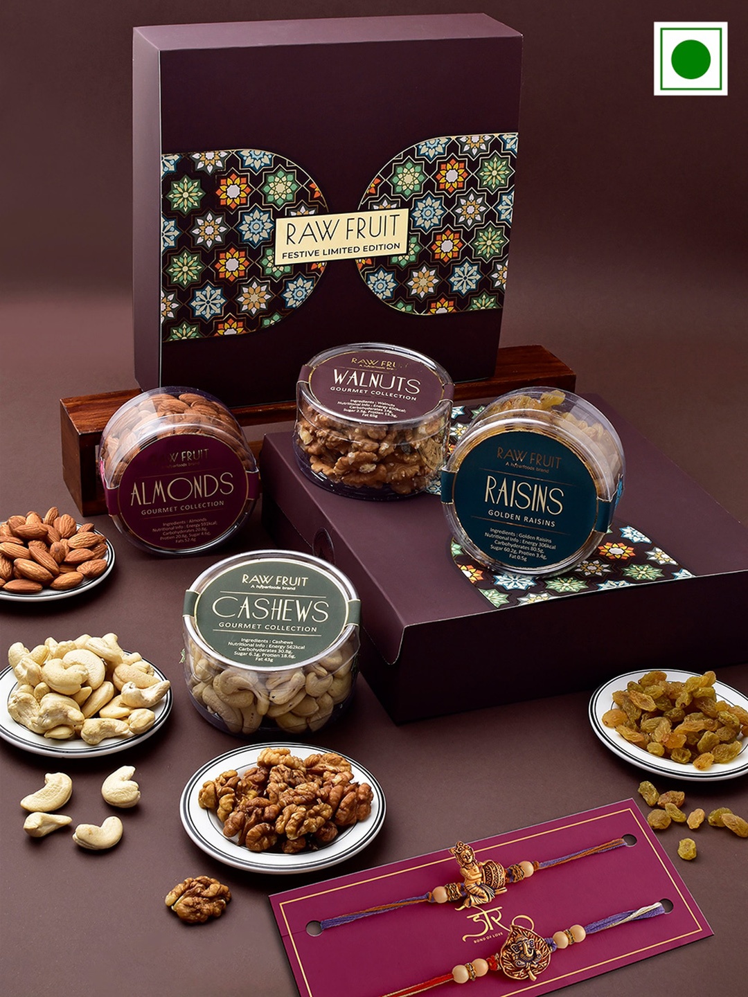

RawFruit Set of 2 Ganesha & Krishna Charm Rakhis With Roli & Chawal & Dryfruits Gift Set, Gold
