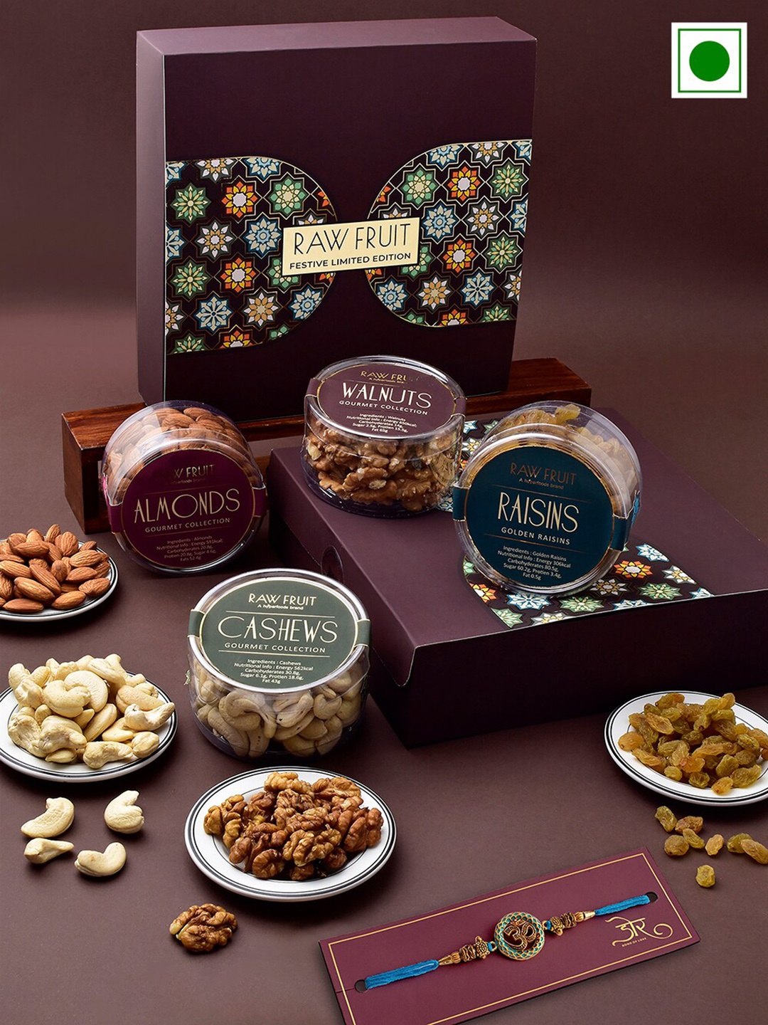 

RawFruit Om Charm Rakhi With Roli Chawal & Nuts Gift Set, Gold